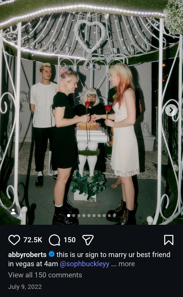 Image - Abby Roberts, is pictured with her wife, Sophie Buckley, on their wedding day back in July 2022.