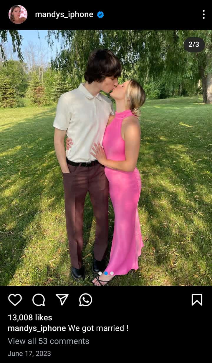 Image - Mandy’s iPhone, is pictured kissing soon-to-be husband, ThatMartinKid, when they ranked their fan base about getting married, back in June 2023.