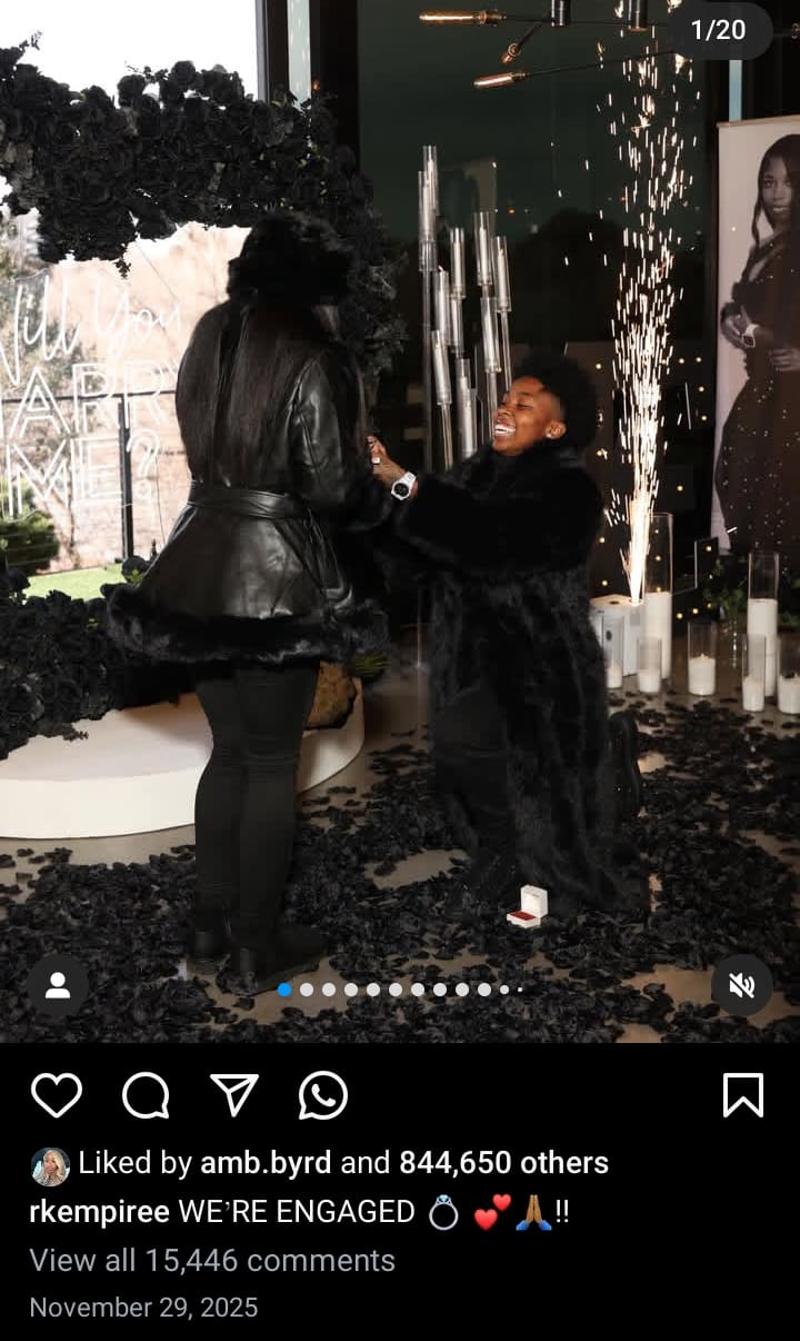 Image - RKEmpiree Kim, is pictured kneeling down as she proposed to soon-to-be wife, RKEmpiree Ramiere, to marry her, back on November 29, 2025.