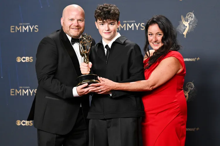 Owen Cooper and his parents pose with his Outstanding Supporting Actor in a Limited or Anthology Series award for "Adolescence" at the 77th Primetime Emmy Awards held at the Peacock Theater on September 14, 2025 in Los Angeles. Credit : Gilbert Flores/Variety via Getty